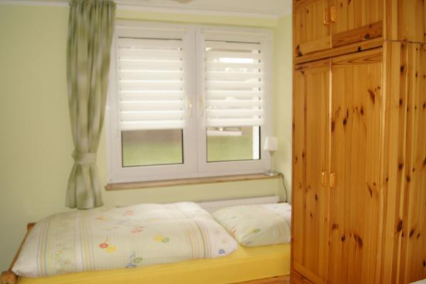 Ferienhaus "Waldidyll" Blick in eines der Schlafzimmer
