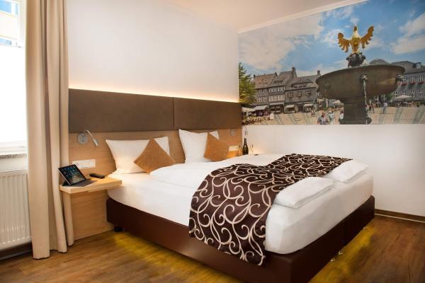 City Appartements am Wall Goslar - Schlafzimmer Rammelsberg